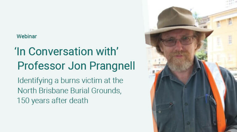 Webinar titled 'In Conversation with Professor Jon Prangnell: Identifying a burns victim at the North Brisbane Burial Grounds, 150 years after death.' The image shows Professor Jon Prangnell, a man with glasses, a beard, and a wide-brimmed hat, wearing an orange safety vest over a dark shirt, standing outdoors in front of buildings